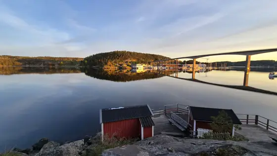 The bridge, the cabin, and the flat water in between