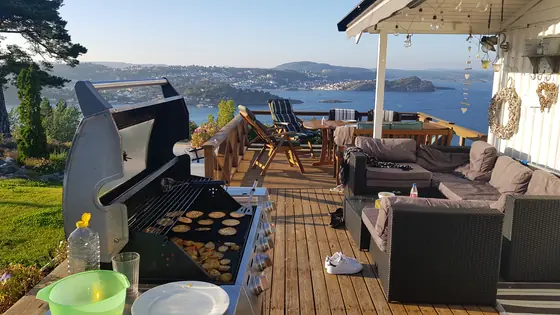 A deck, a grill, and a view