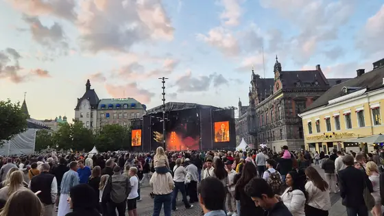 Outdoor stage, long summer evening