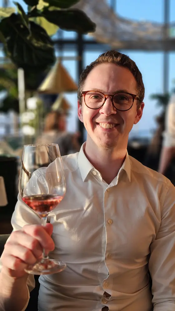 A glass of something pink, and no further plans