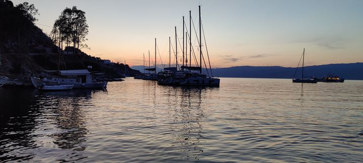 Sailing boats moored at dusk